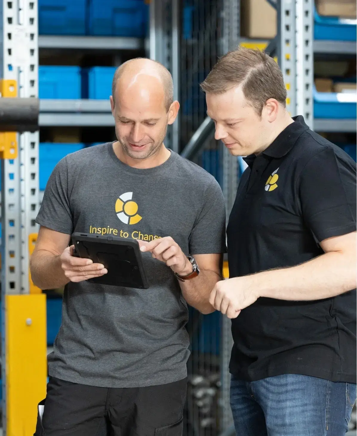 2 Developers checking an App on a tablet